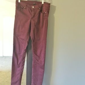 Plum coloured mid ride skinny jeans